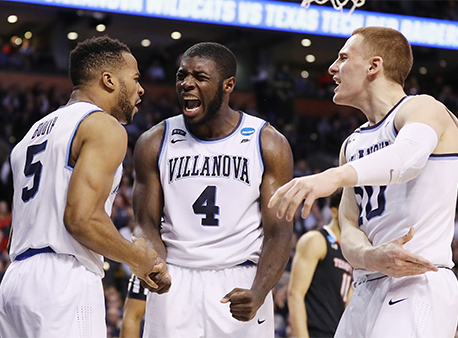 Eric Paschall, Phil Booth and Donte DiVincenzo of the Villanova Wildcats celebrate during NCAA Tournament action